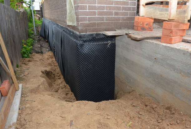 SJ Waterproofing Pros technician performing targeted Waterproofing assessment in Vesper, WI